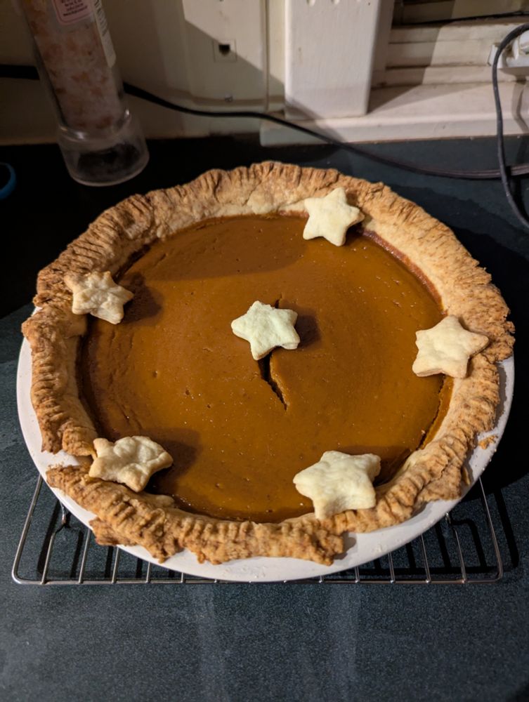 Pumpkin pie with pastry star cutouts