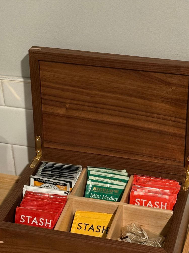 The box is open revealing many sorted teas!