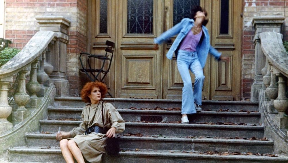Céline & Julie on the steps of a house, pre-boating.