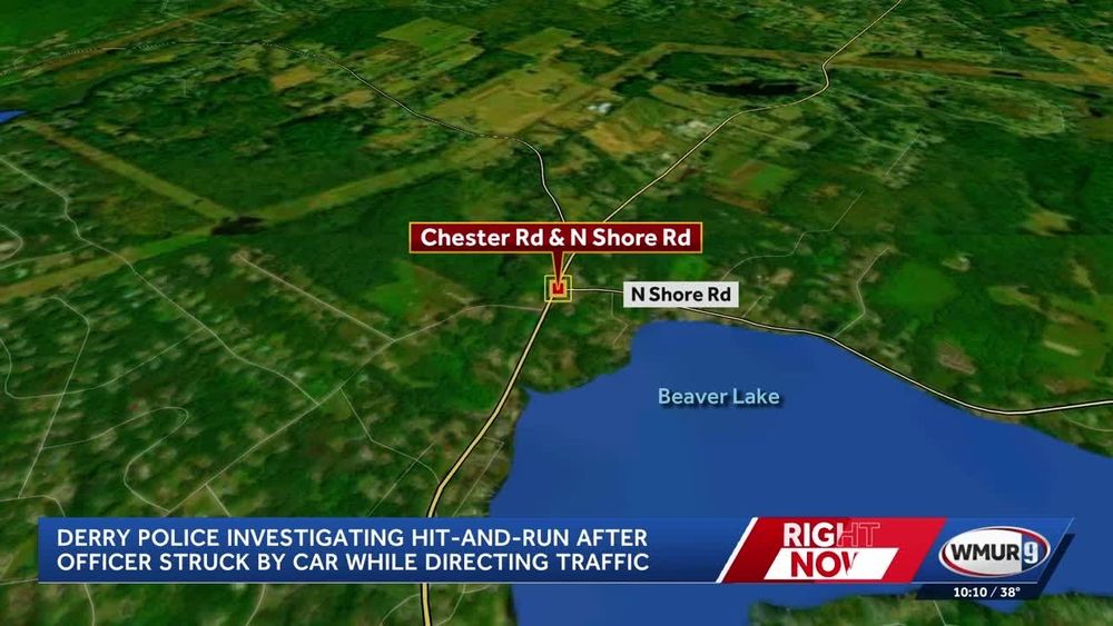 A WMUR9 news graphic map showing the intersection of Chester Road and North Shore Road near Beaver Lake in Derry, New Hampshire. The headline at the bottom reads, “Derry police investigating hit-and-run after officer struck by car while directing traffic,” with the “Right Now” and WMUR9 logos in the lower right corner.