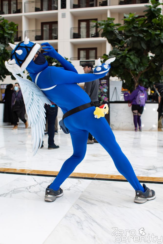 Blue Shell cosplayer from the Mario Kart series doing a pose from the Jojo's Bizarre Adventure series