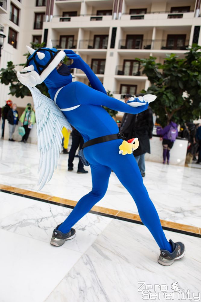 Blue Shell cosplayer from the Mario Kart series doing a pose from the Jojo's Bizarre Adventure series
