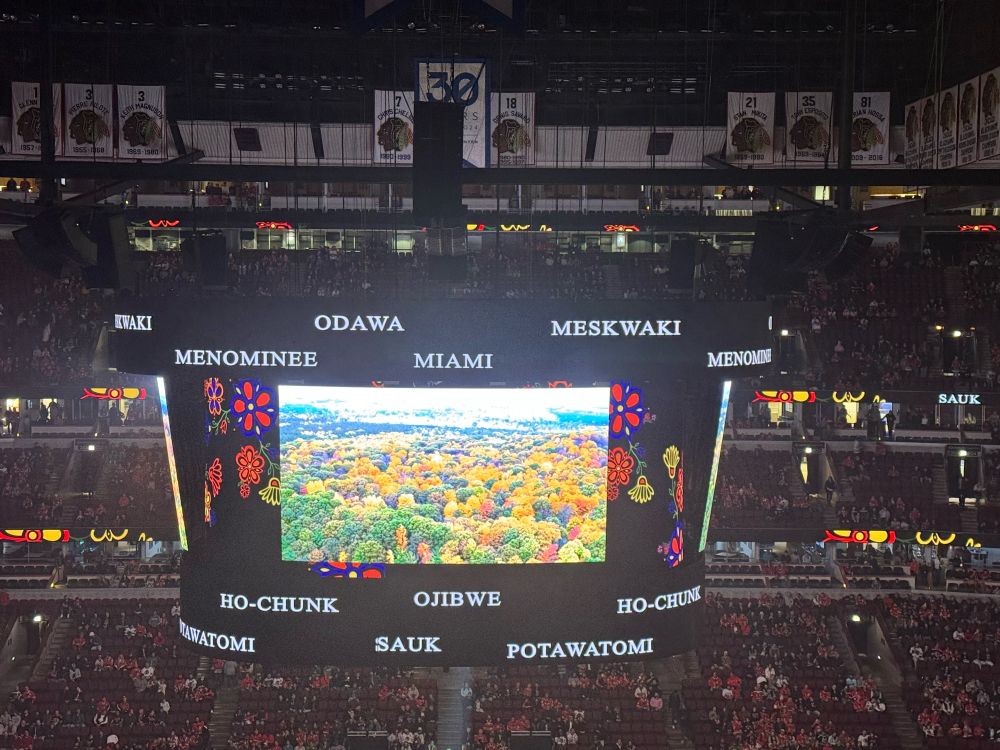 Picture of the Jumbotron at United Center in Chicago showing the Chicago Blackhawks’ land acknowledgement before the game. 