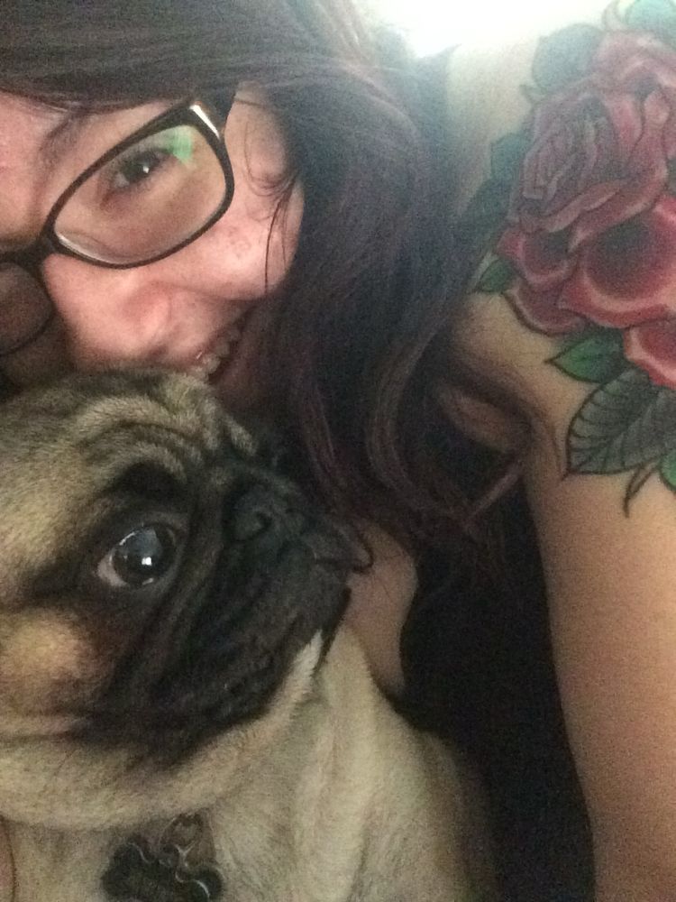 Photo of me snuggling a pug from 10+ years ago