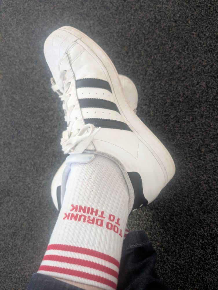 Sports socks that say "too drunk to think"