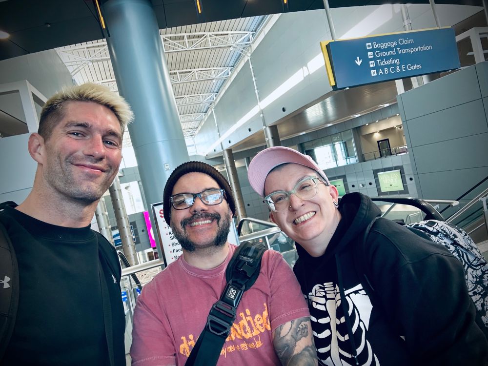A photo of Zack Sabre Jr, Irving West, and Andey Ripley at the Las Vegas airport. 