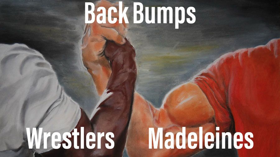 A picture of Arnold Schwarzenegger and Carl Weathers clasping hands while flexing. It says “wrestlers” over Carl Weathers and “madeleines” over Arnold, with “back bumps” o er the hands. 