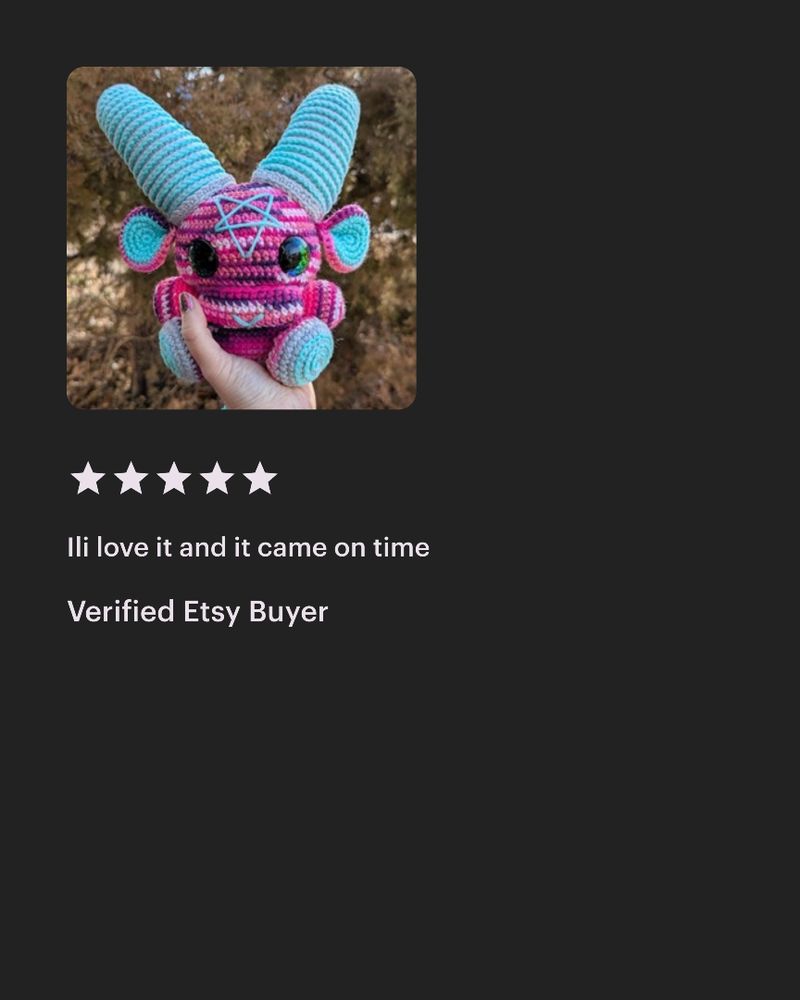 Crocheted pink and blue baphomet displayed in a hand. Five-star review praising timely delivery from a verified Etsy buyer.