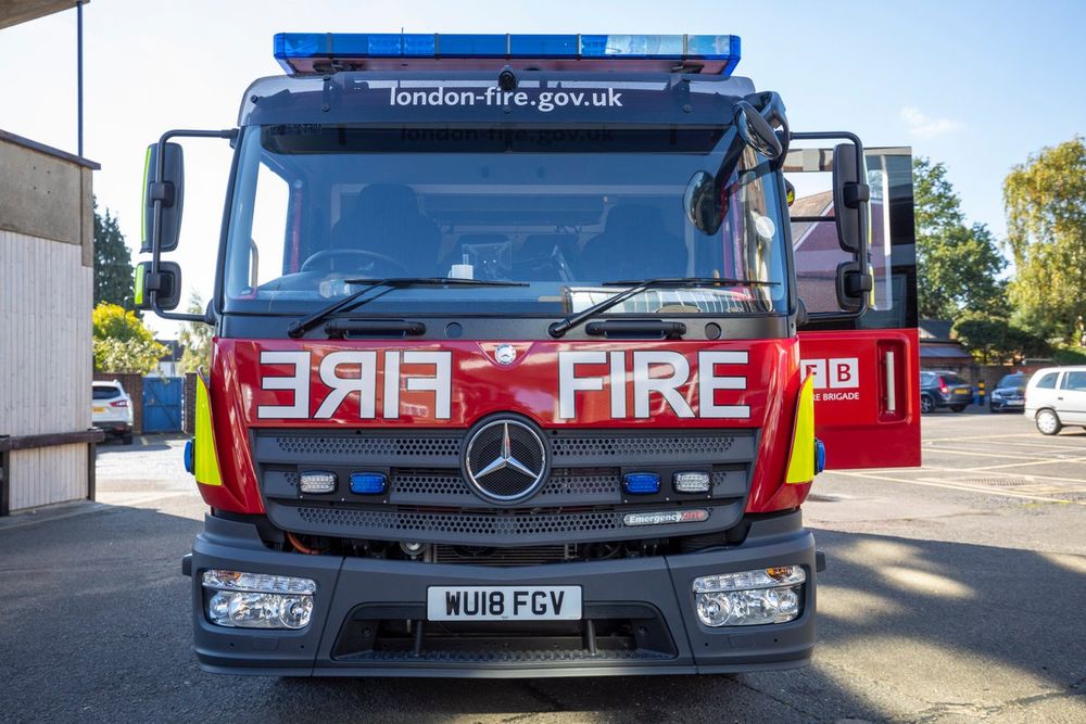 Front of a fire engine in a yard