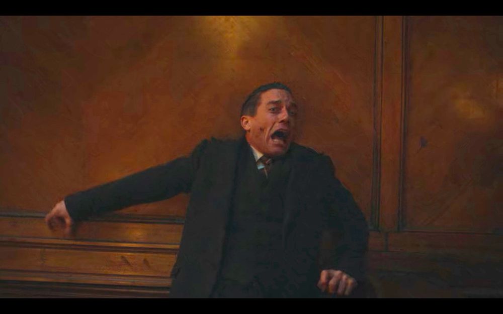 A still from the German tv series “Babylon Berlin” depicting the show’s main protagonist, Inspector Gereon Rath, screaming in fear as usual.