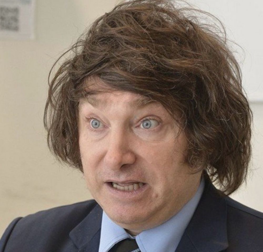 A photo of some bloke or other looking like he's frozen. 