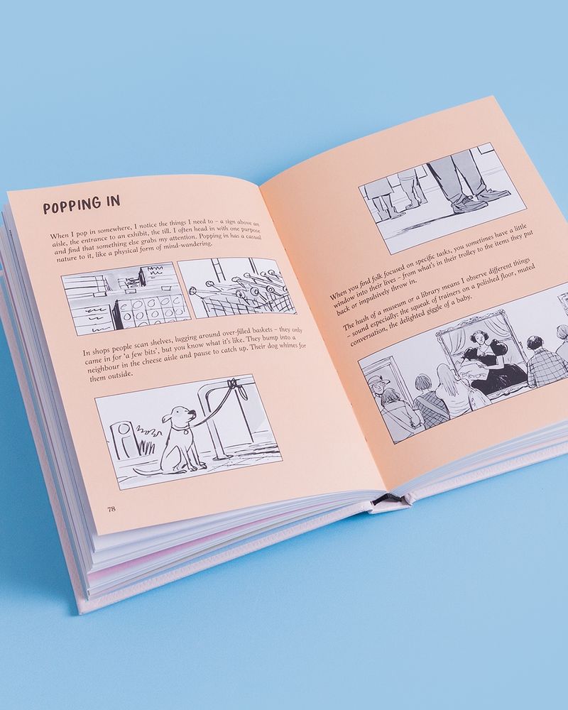 A photo of a double-page spread from the chapter ‘POPPING IN’ against a blue background. The colour of the pages is pink and the text is black and illustrations are in black and white. There are observations by me (the text is too small for most people to read I this image) and a black-and-white illustration on the left-hand page by Adam Beer, of buildings, a shopping trolly, a dog tied up with its lead outside a shop, some peoples’ legs and feet, and people at a gallery looking at a painting of a woman in a black dress.