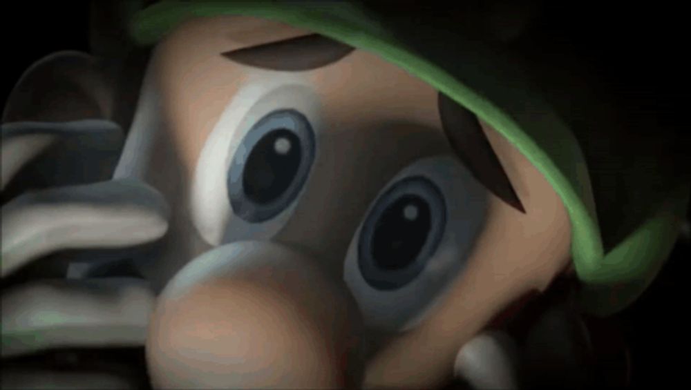 a close up of a cartoon character 's face with a green hat on