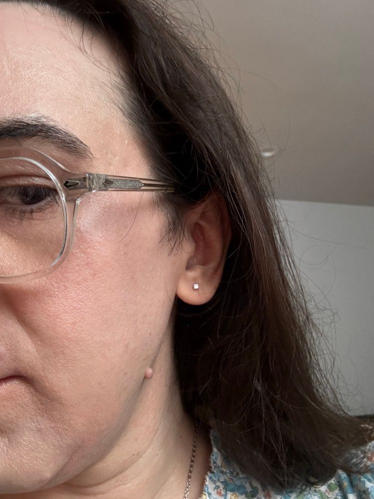 left ear = cubic zirconium stud