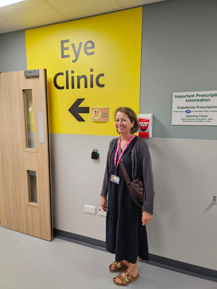 Jane Mischenko, Co-Chair of Healthwatch Leeds, stood outside the Eye Clinic at Leeds Teaching Hospitals NHS Trust