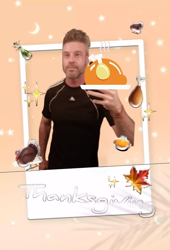 And man in a black shirt holding a turkey