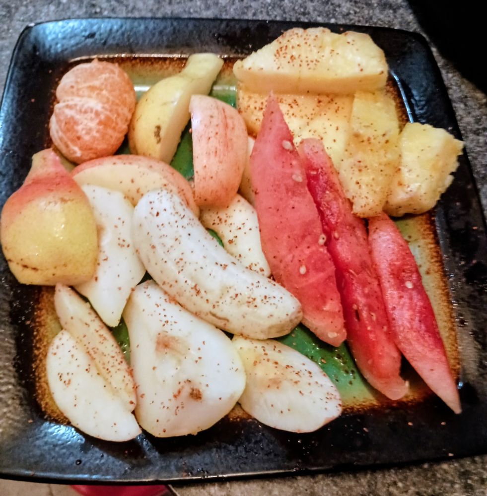 Pear, watermelon, pineapple, manzano's, mandarin, and pink lady apples. 