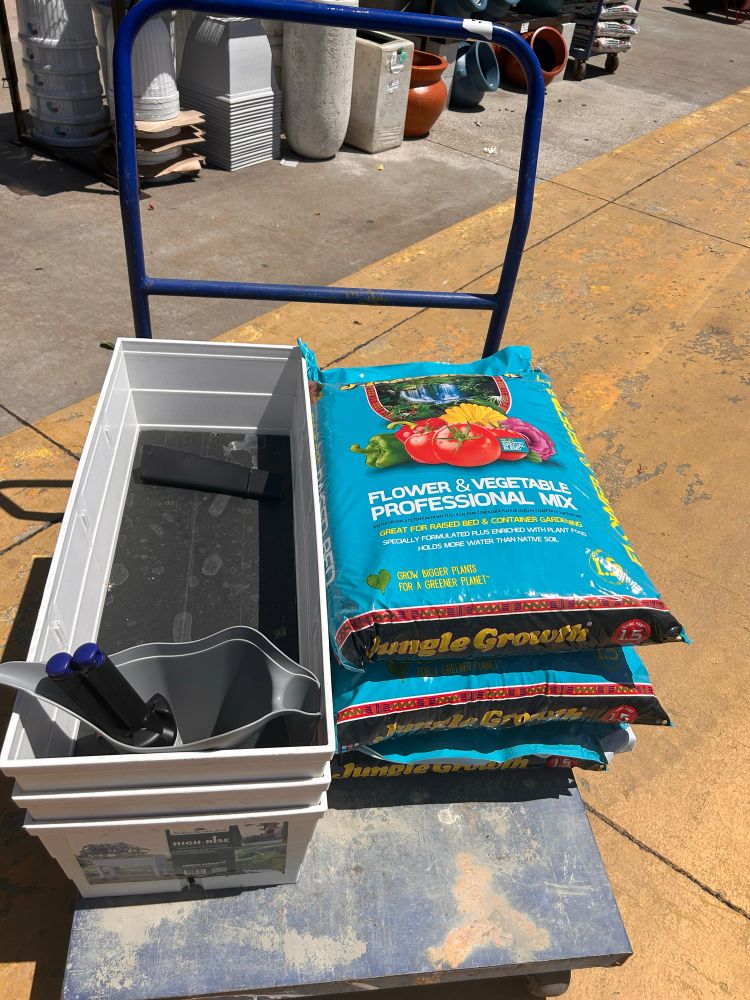 Raised Garden Beds and Soil on cart 