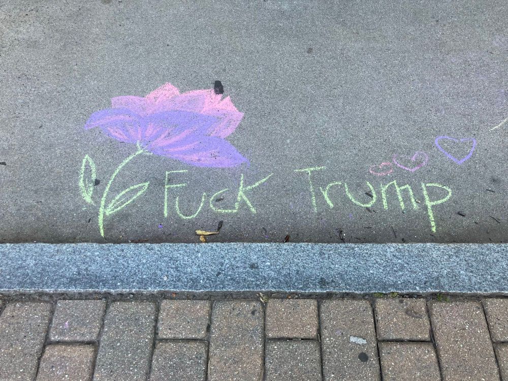Keene NH Labor Day weekend Music Festival — street art — sidewalk chalk art — “Fuck Trump”