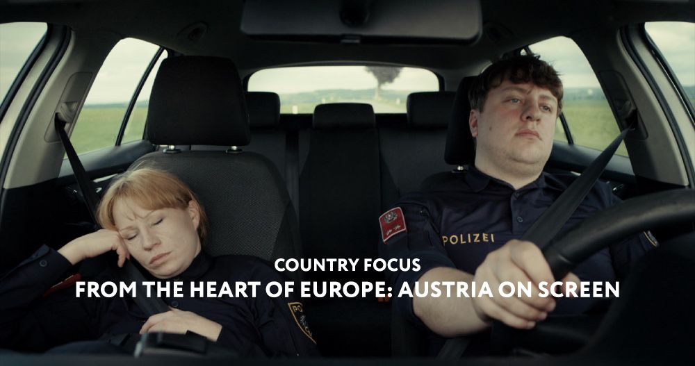 Image from Andrea gets a Divorce showing two characters driving in a car. Text read "Country Focus: From the Heart of Europe: Austria on Screen"