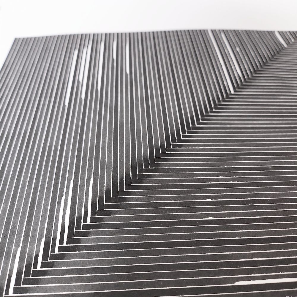 close up of parallel lines drawn with a wide calligraphy fountain pen