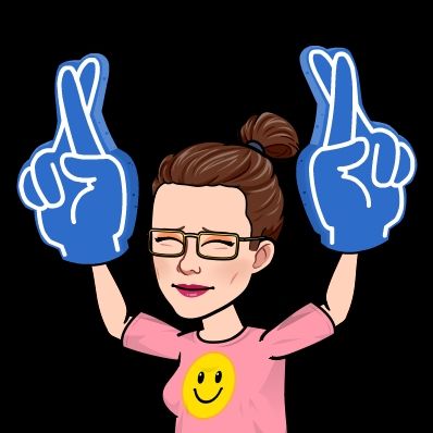 My avatar with a pink t shirt on with a yellow smiley face on the front, with big blue foam hands with my fingers crossed. 