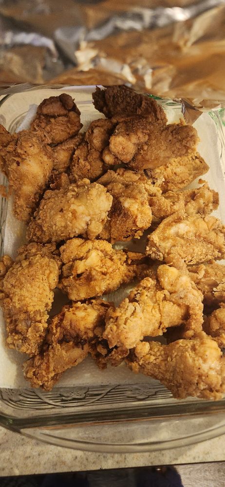 Pan of freshly fried chicken wings