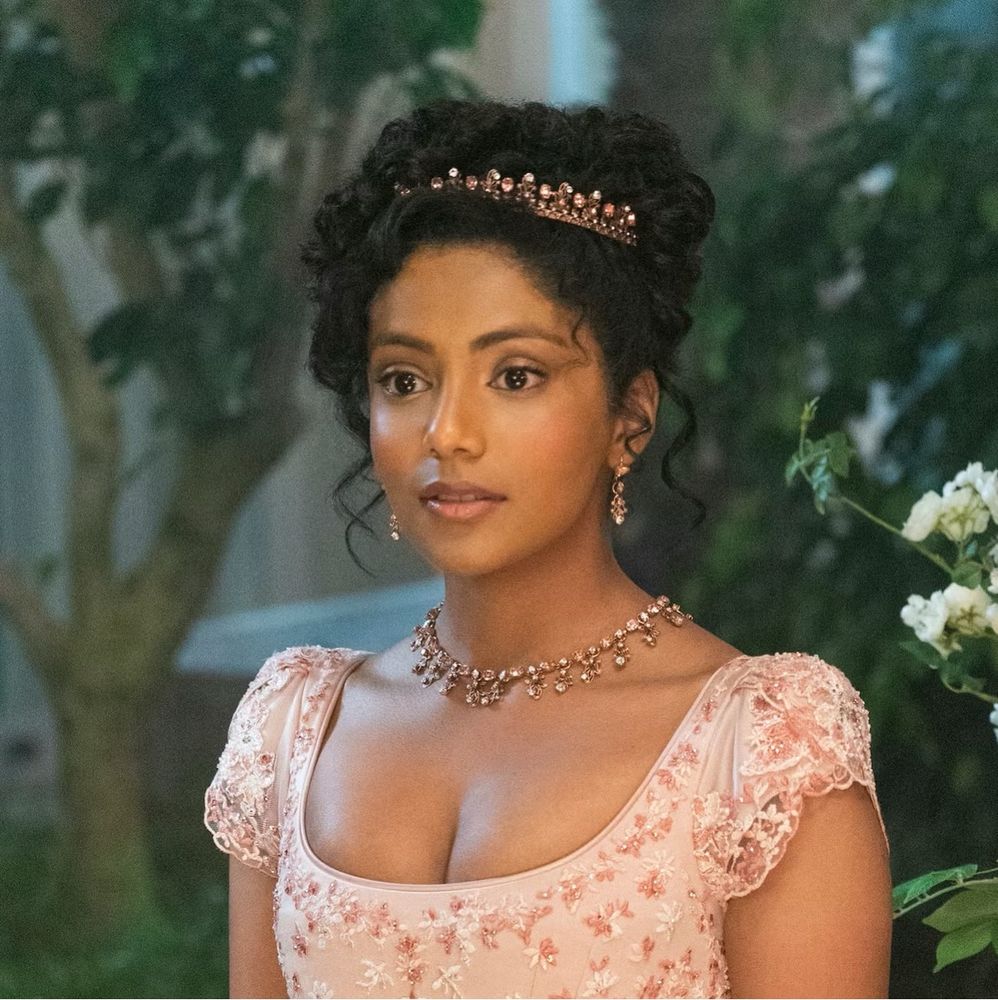 Charithra Chandran, who would make an incredible Rapunzel, looking absolutely stunning as a Bridgerton character whose name I don't know in since I've never seen it 