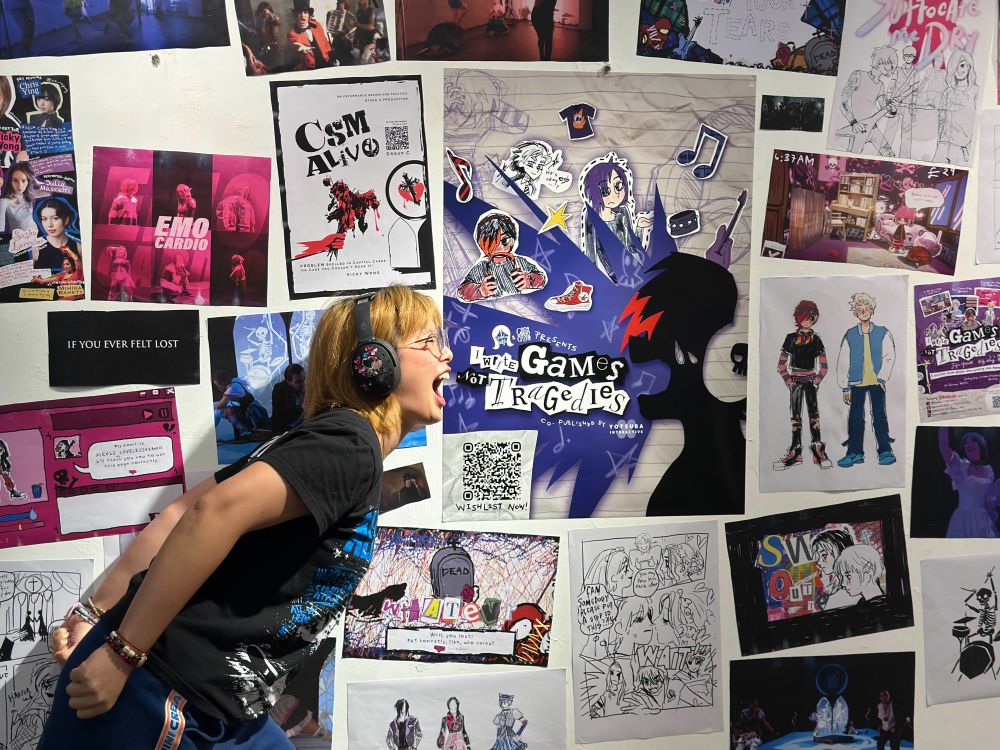 'I Write Games Not Tragedies' an emo visual novel x rhythm game being exhibited at FringeYouth Festival in Hong Kong. Image of Vicky, one of the developers.