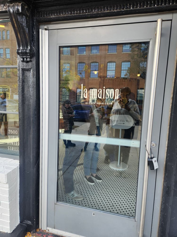 front door of la maison - a bakery in Baltimore