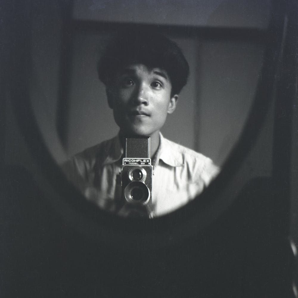 Photographic self-portrait by Japanese poet Tanikawa Shuntarō.