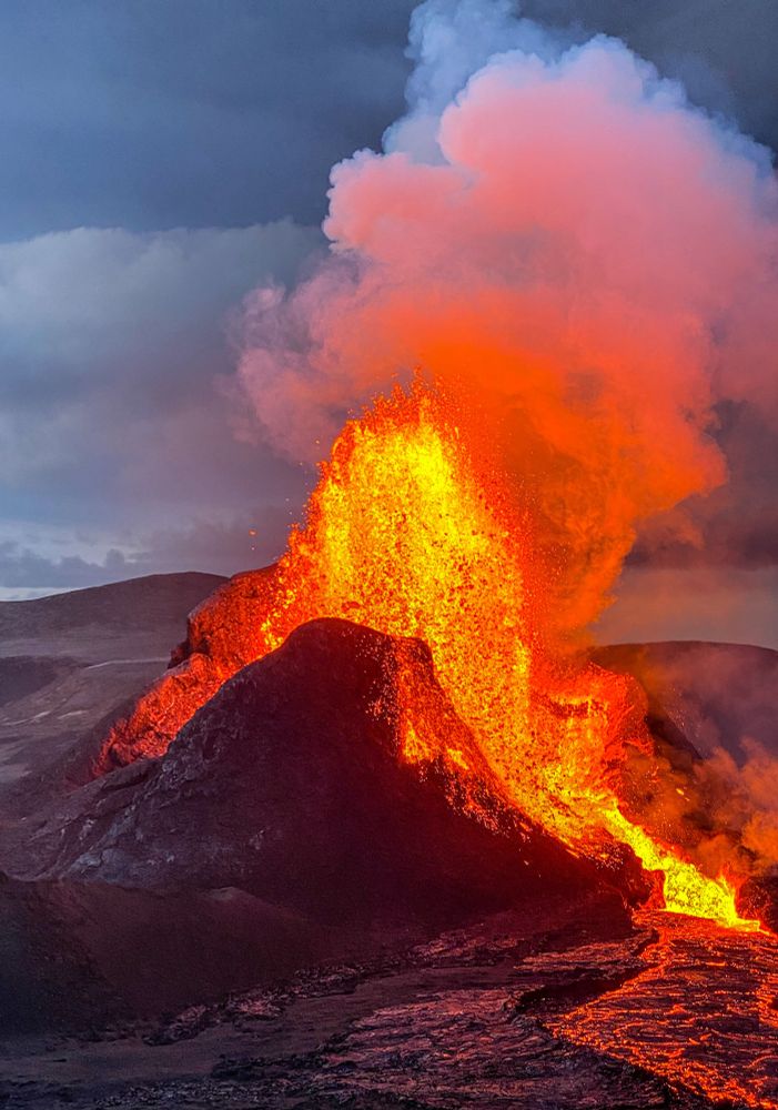 Close-up of Fagradalsfjall, May 2021. Fountains of lava shoot from a v-shaped crater 