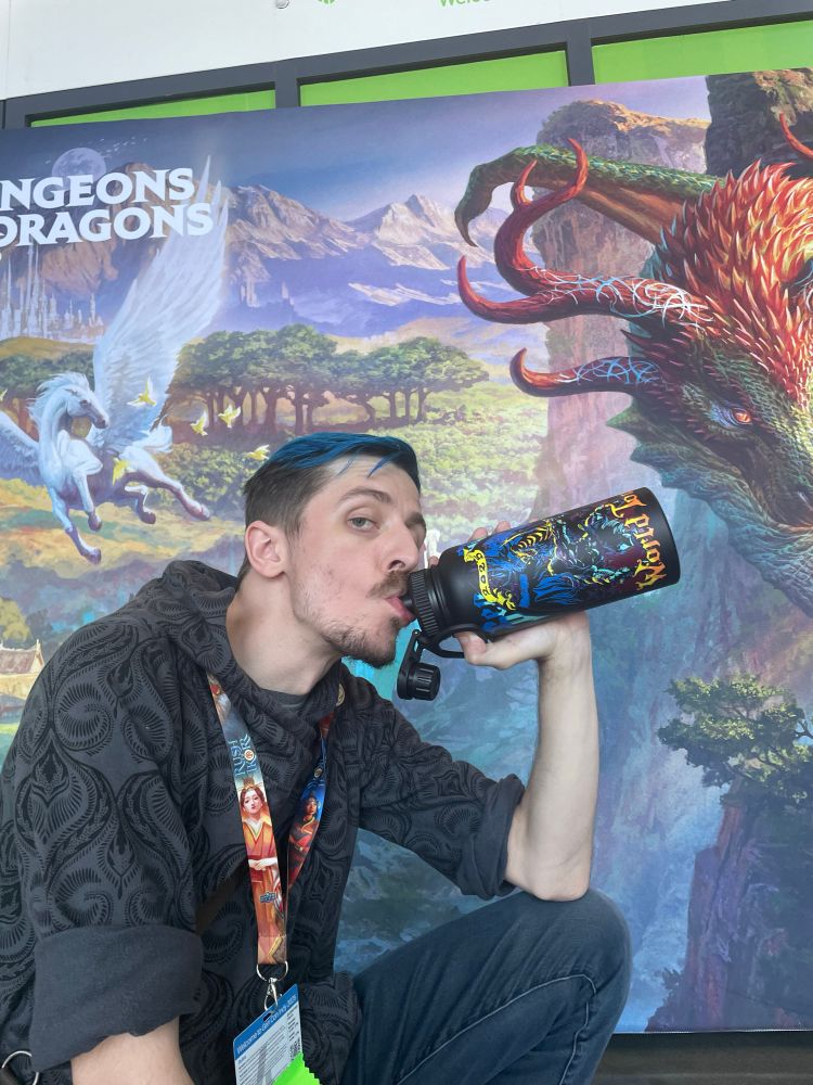 Me drinking in front of the D&D display