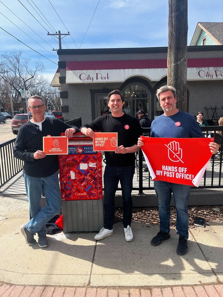 Nathaniel poses with CUPE leadership