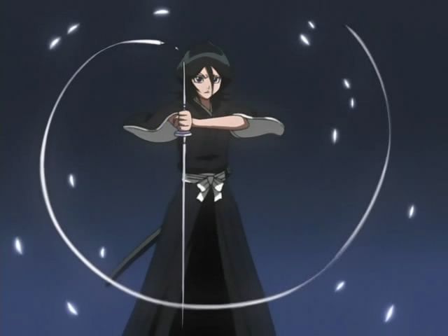 Rukia from Bleach holds her Zanpakutō.
The hilt, blade and tsuba white and a long white ribbon is connected to the bottom of the hilt.