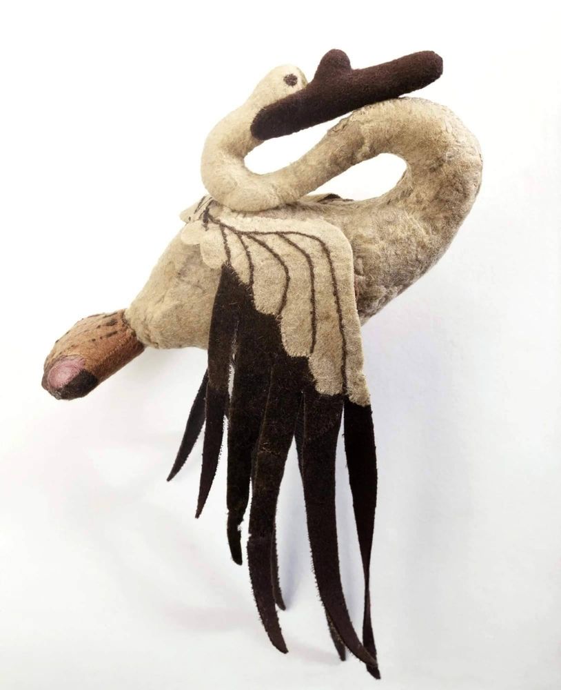Stuffed bird a crane not Taxidermy but made out of felt and stuffing so a stuffed animal from 2400 years ago pretty crazy this was in a grave in Siberia in a barrel where a combination of how it was buried and the fact that it was frozen for a couple of thousand years have preserved it incredibly