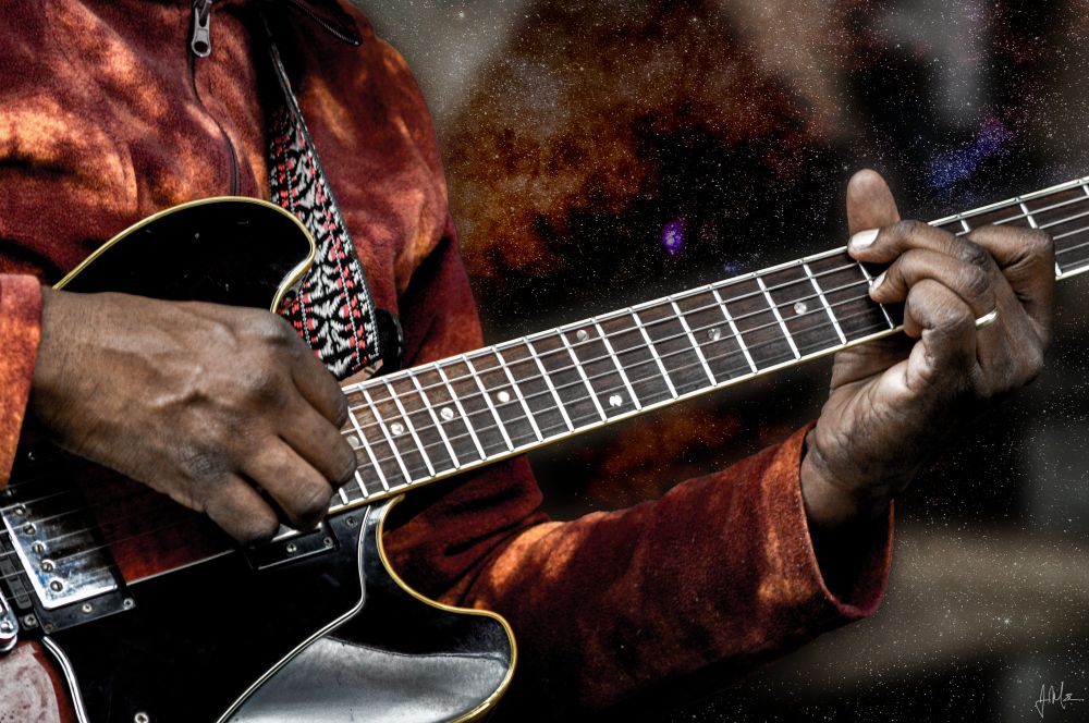 A closup of DM Hotep's guitar as he plays with the Sun Ra Arkestra at Music on the Mountain music festival on Okemo Mountain in Ludlow, VT on 5/17/2025