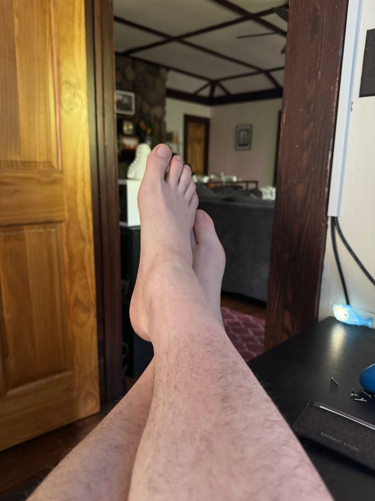 My feet, crossed at the ankles.