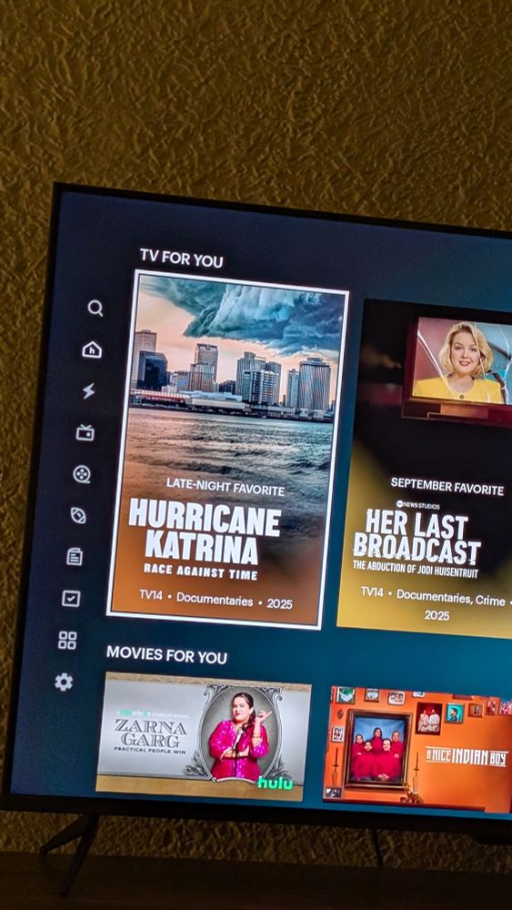 The on-screen Hulu menu including "Hurricane Katrina: Race Against Time" which is billed as a "Late-Night Favorite" above the display title 