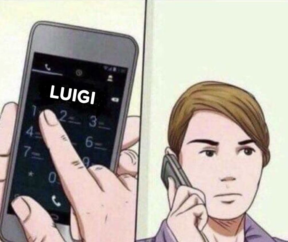A man calling Luigi on a cellphone.