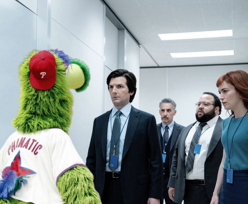 The Phanatic in Severance. He’s in a white hallway opposite the 4 main cast members. His work is mysterious and important.