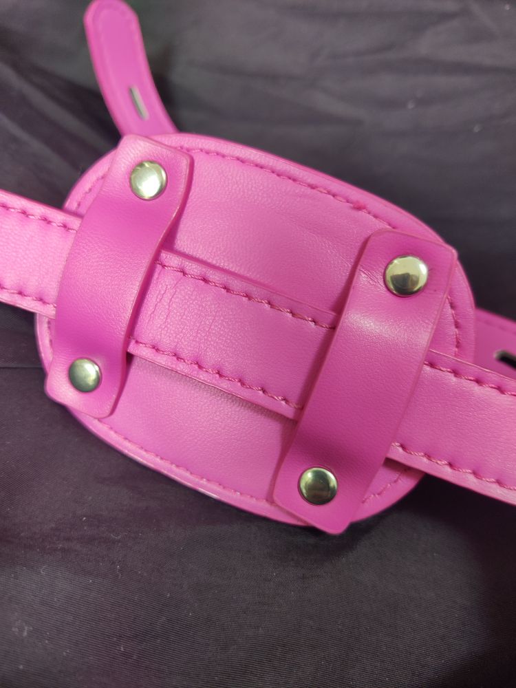 it's a magenta pink panel gag that had nickel plated hardware! the rivets on the panel are shown here. they're... not great. 