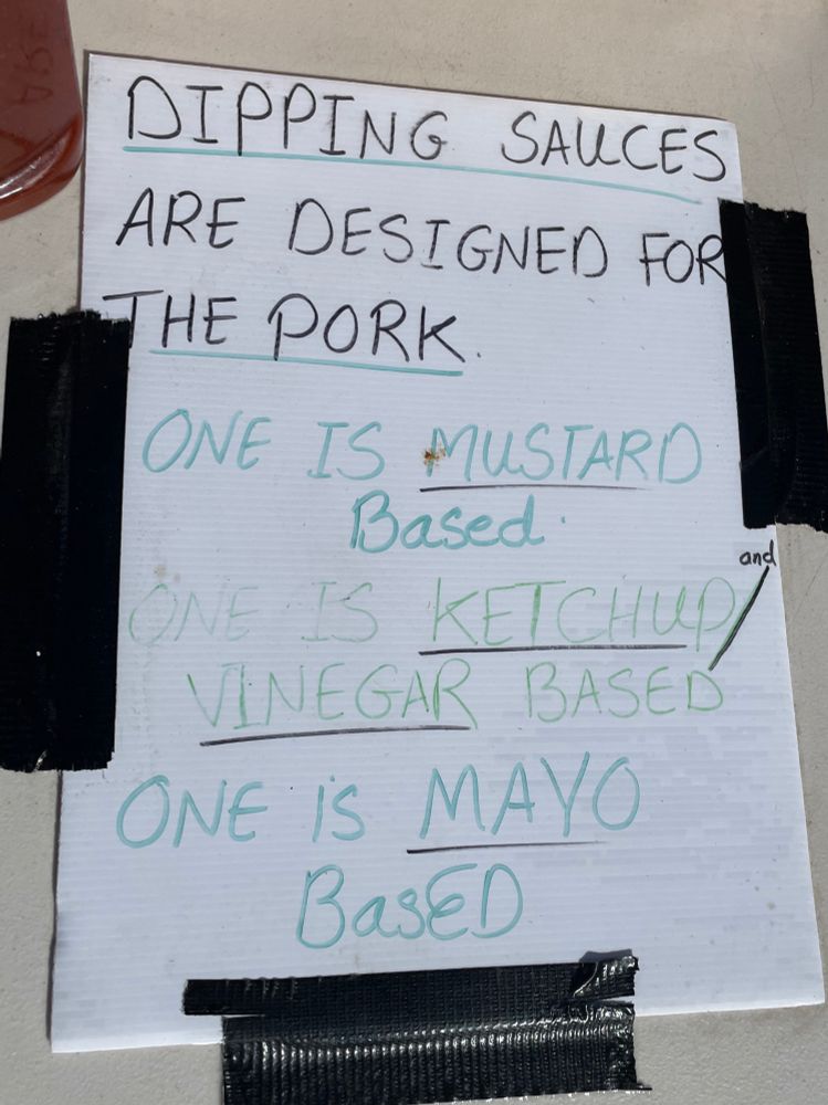 handwritten sign that says 