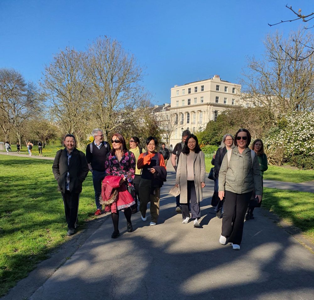 Group of people walking in Regent's Park, London