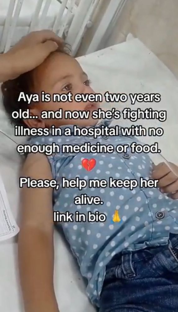 Caption on Traji’s video of Aya laying exhausted on a hospital bed: “Aya is not even two years old, and now she’s fighting illness in a hospital with not enough medicine or food. Please, help me keep her alive.”