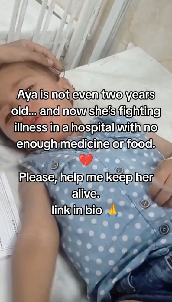 Caption on Traji’s video of Aya laying exhausted on a hospital bed: “Aya is not even two years old, and now she’s fighting illness in a hospital with not enough medicine or food. Please, help me keep her alive.”