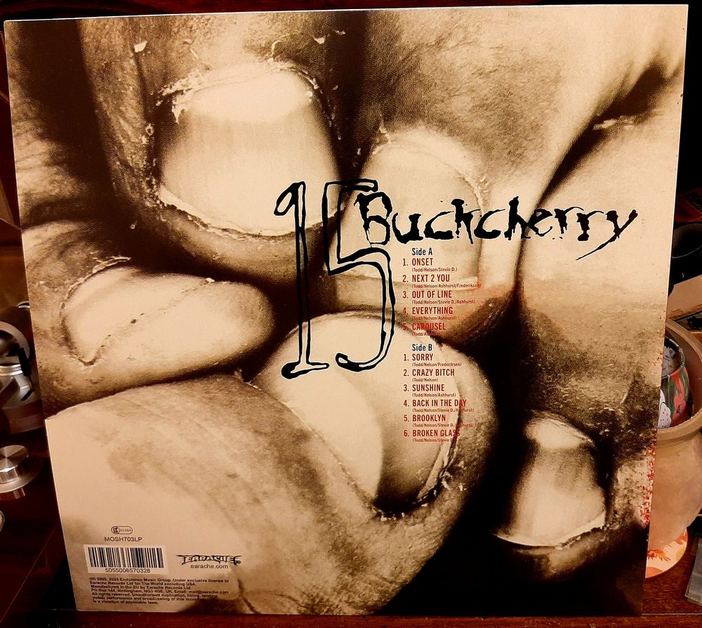 "15" by Buckcherry - rear artwork of outer sleeve. 