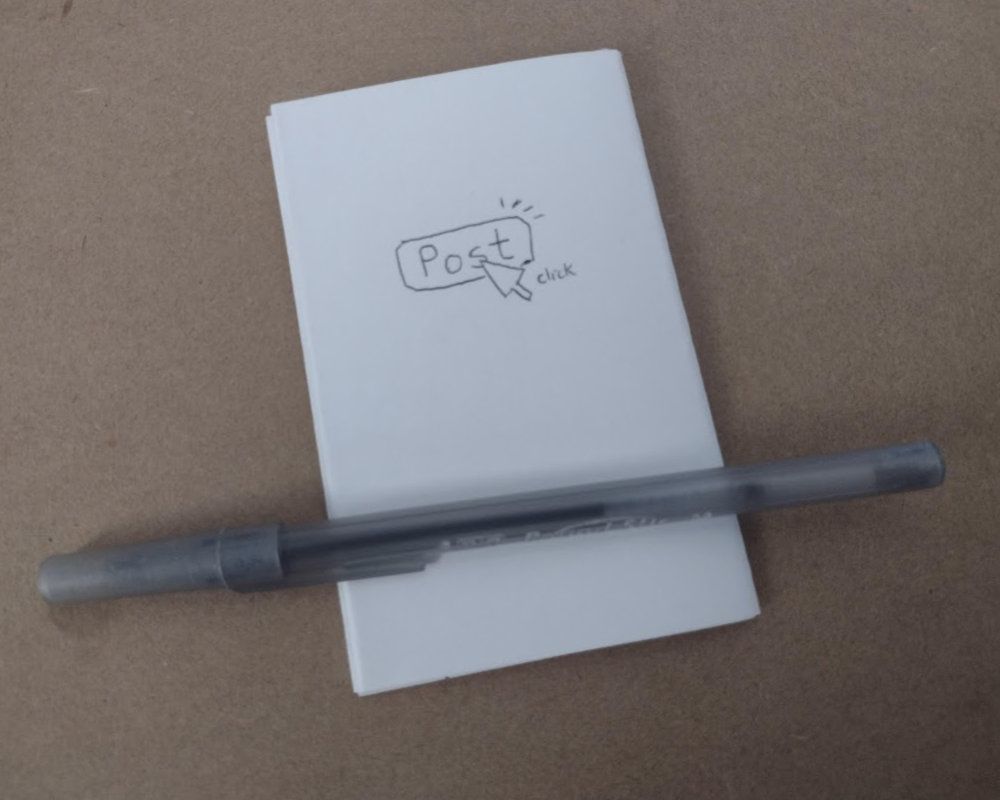 the back of the zine with a pen drawing of a cursor hitting the Post button
