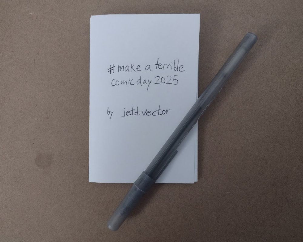 a closed zine titled "#makeaterriblecomicday2025" with a Bic pen