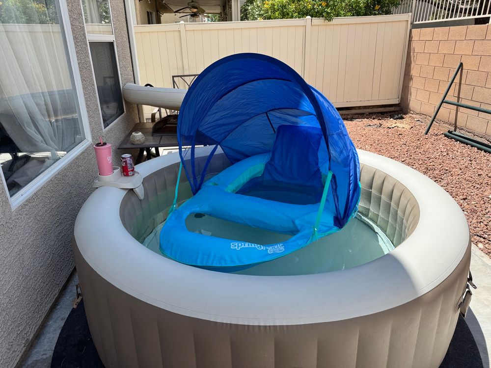 A pool float floating in an inflatable hot tub